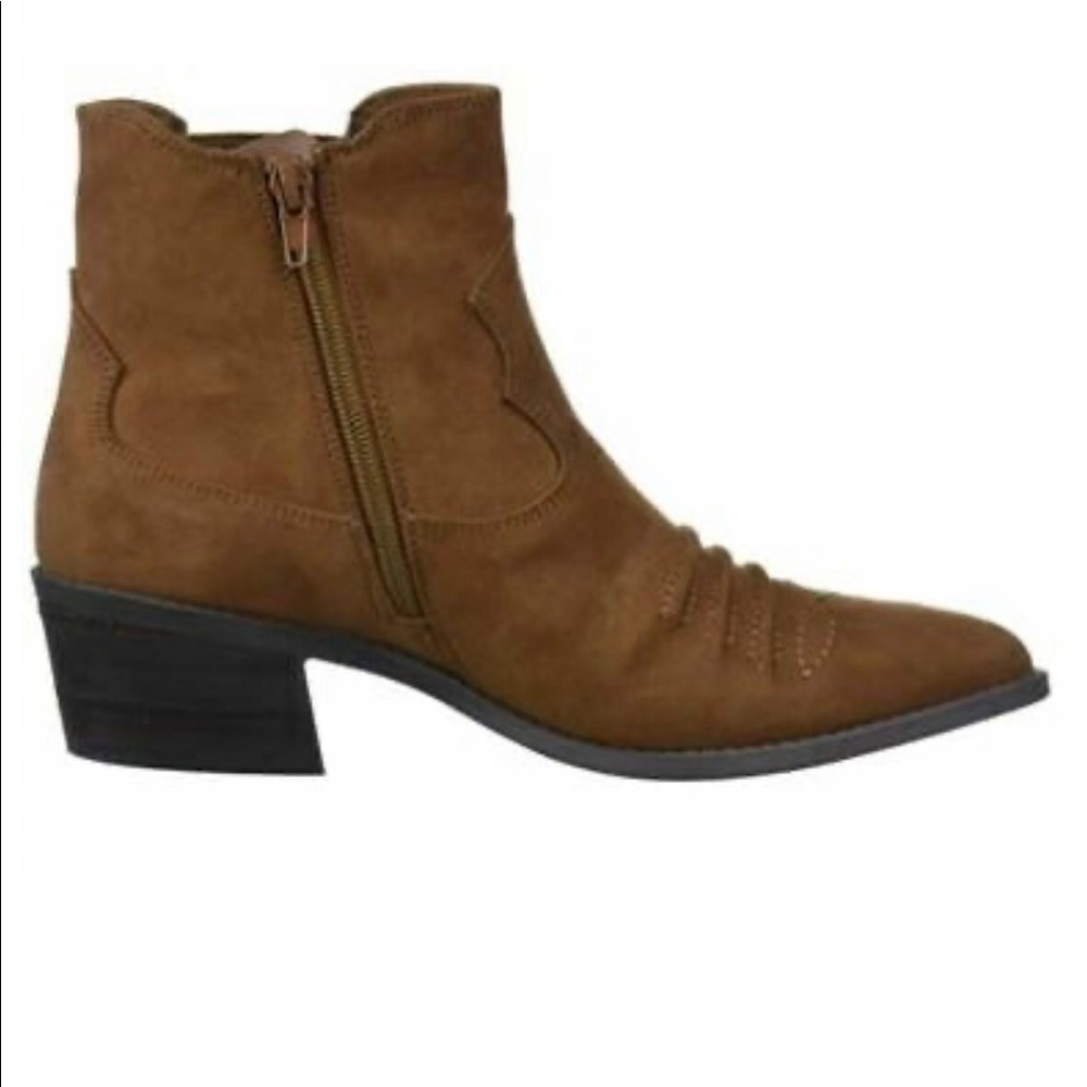Montana boots with a cowgirl accent.